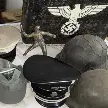 DURANTE DOS ALLANAMIENTOS HALLARON UNA CAJA CON SIMBOLOS NAZIS, ARMAS Y UN DETONADOR  